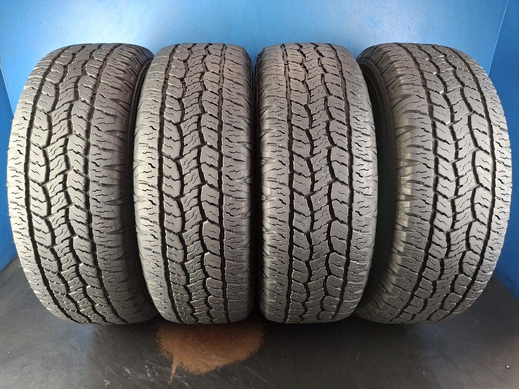 275 65 18 SET(4) (S131) GOODYEAR WRANGLER TRAILMARK 90% TREAD