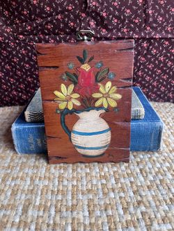 Vintage wall plaque with floral painting