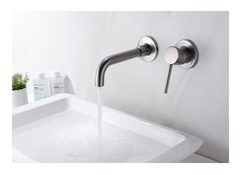BRAND NEW; NEVER USED WALL MOUNTED FAUCET