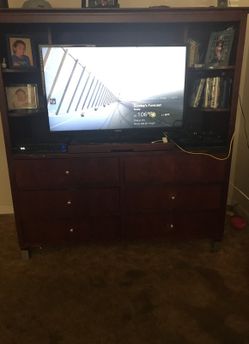 Cherry wood tv stand.