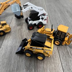 Diecast 1/32 scale ERTL Bobcats and construction backhoe loaders fully metal asking 70 dollars for all of them 