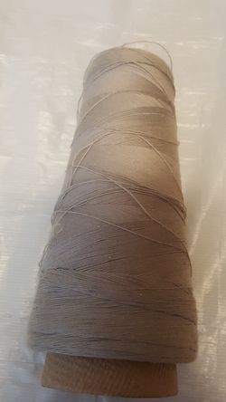 Bulk grey sewing thread