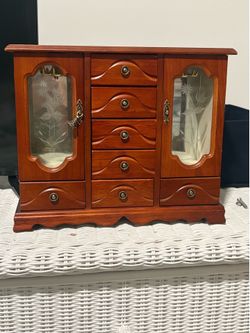 Wooden Jewelry Box with etched glass doors.
