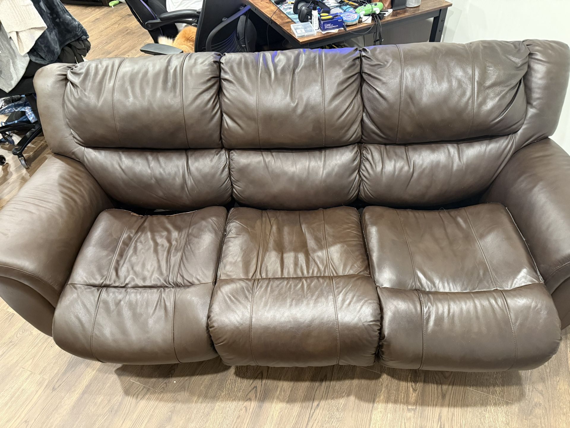 Refurbished and Patched Bonded Leather Pullout Couch