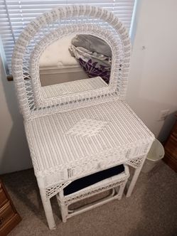 Wicker make up table with matching bench