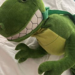 Ride The dinosaur costume.  Toddler 2-3T