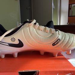 soccer cleats 3 different sizes and colors
