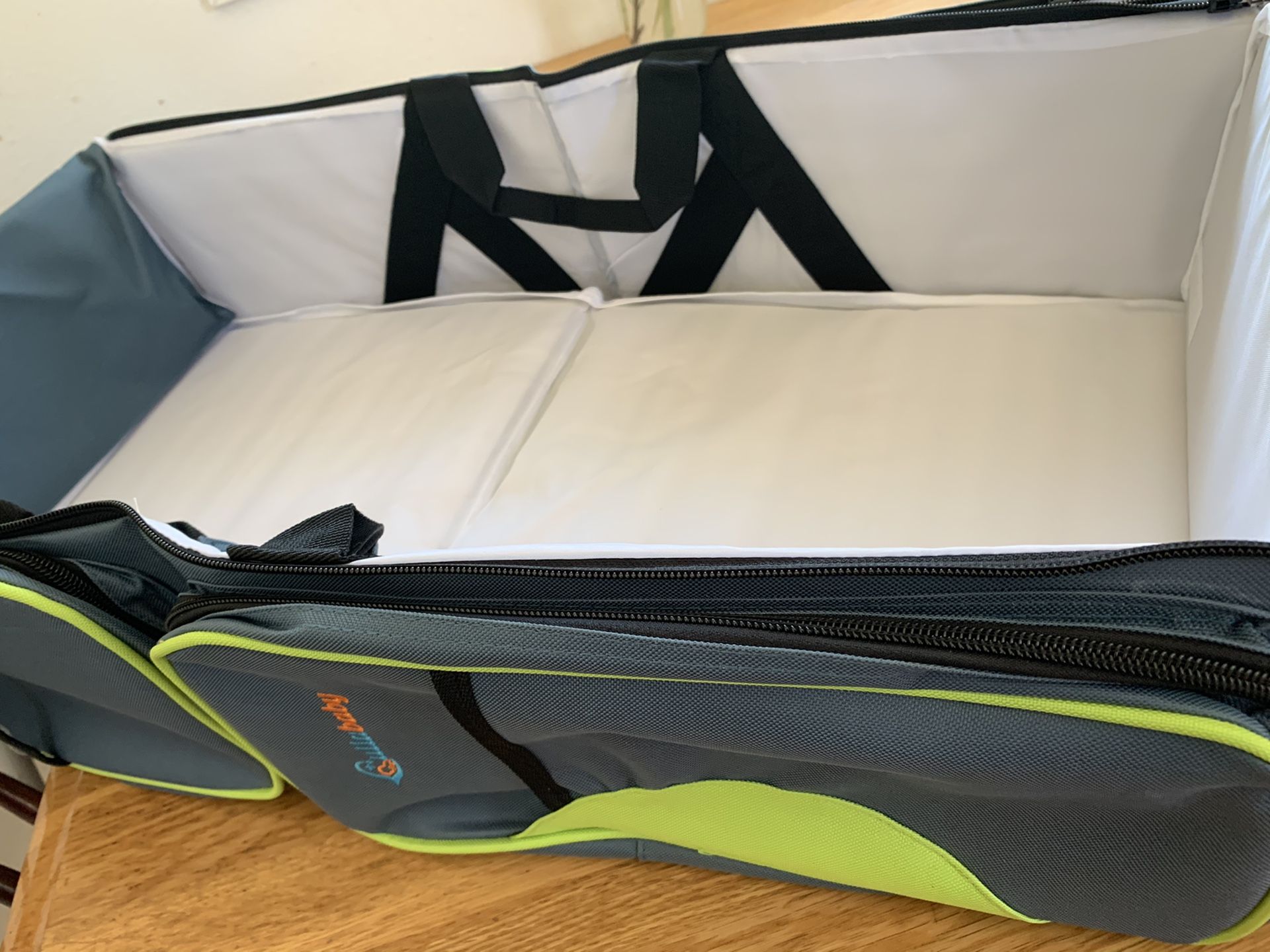 Travel bassinet, changing table, diaper bag