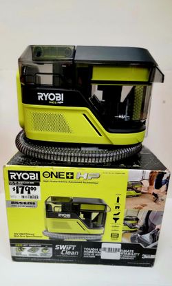 cordless spot cleaner is part of the Ryobi ONE+ HP brushless line. This mid-size machine has a lime green and black plastic housing with a clear recov