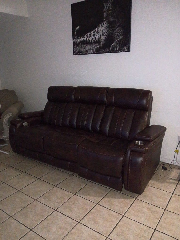Semi-new electric sofa, reclining leather, brown color
