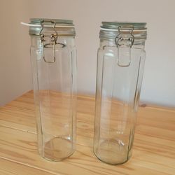 Like new! 2 Tall glass jars with hinge lids