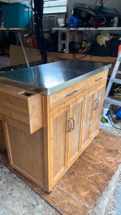 Kitchen island with stainless top