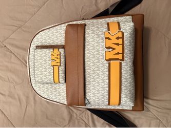 Brand new MK backpack and wallet.