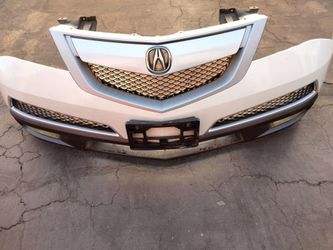 2010 2011 2012 2013 Acura MDX front bumper with Grill and emblem and fog lights with accessories OEM.