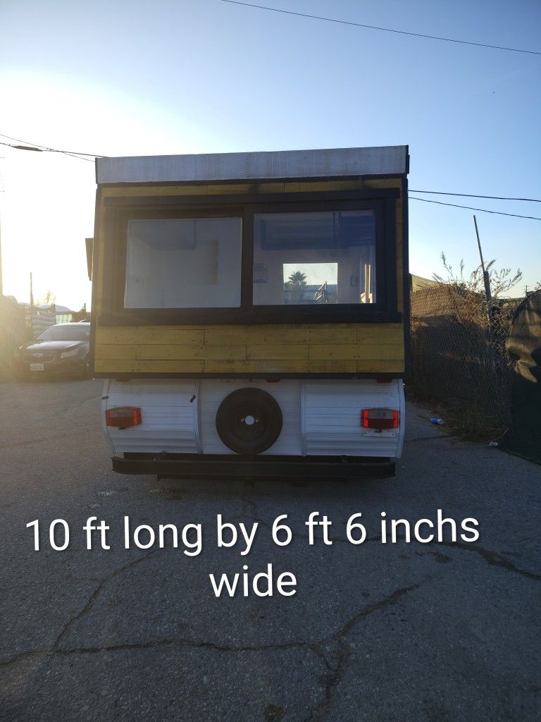 A. U.D"Vintage Trailer Tiny Home