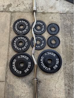Olympic weight set 95 lbs + bar - Clips