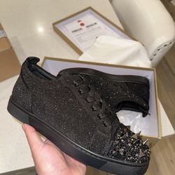 Christian Louboutin “ Red Bottoms “