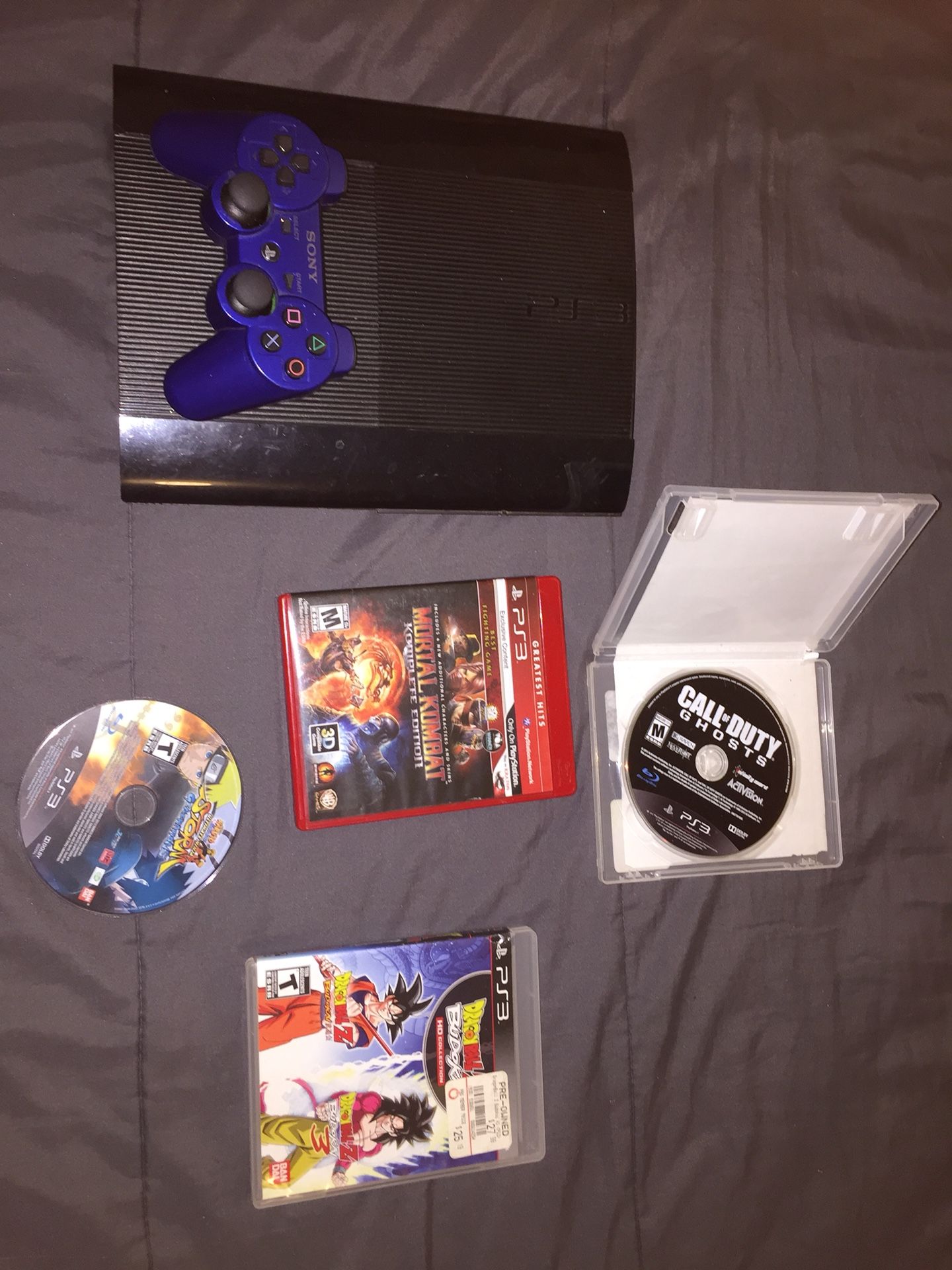 PS3 with 4 games and one controller + Headphones