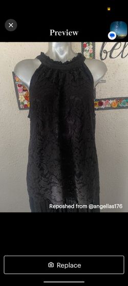 Vera Wang black lacy sleeveless blouse in great shape. Size 1X