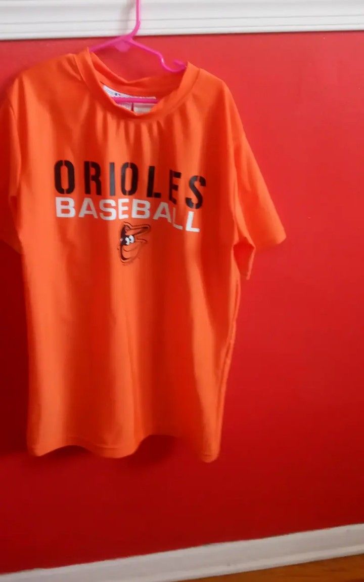 ORIOLES KIDS SIZE 14/16 , T-SHIRT.... CHECK OUT MY PAGE FOR MORE ITEMS