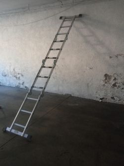 Warner 12 -1/2 ft telescoping aluminum ladder multi position in excellent condition
