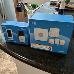 RING battery doorbell, outdoor Cam and 5 piece Alarm brand new!! Alarm system