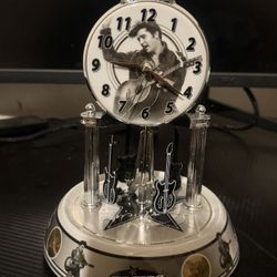 Elvis Presley Porcelain Base Anniversary Clock 9x6” With Moving Guitars