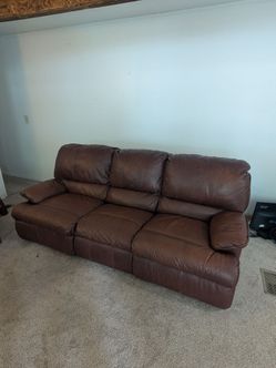 Brown leather couch , reclining sofa