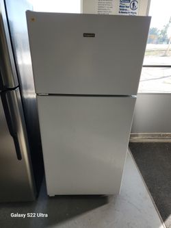 Used refrigerator 28 in wide 61 in tall plugged up cold and clean 30 days warranty cash only