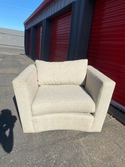 Oversized Beige Modern Swivel Chair