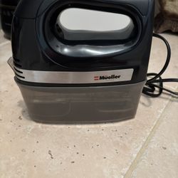 Mueller Electric Hand Mixer with snap on storage case. 4 stainless steel accessories 