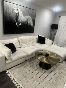 L-type sofa plus coffee table plus painting
