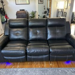 LED Reclining Leather Couch - Ashley Furniture - Make An Offer
