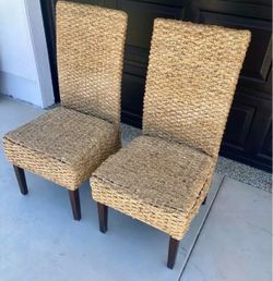 2 Coastal woven rattan dining or side chairs