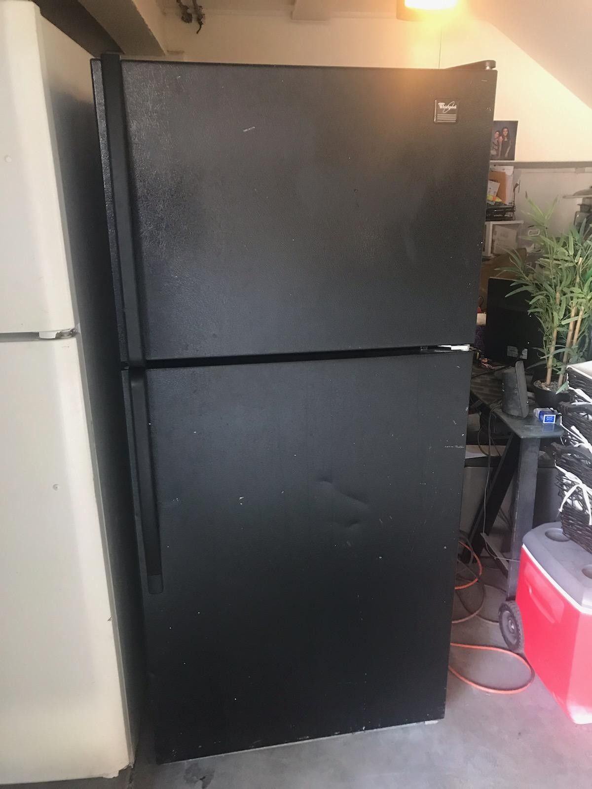 $199 Whirlpool black 18 cubic fridge includes delivery in the San Fernando Valley a warranty and installation