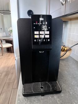 Brio Q20 reverse osmosis counter top water dispenser.