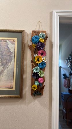 Homemade pinecone wall hanging