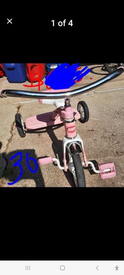 Little girls tricycle.
