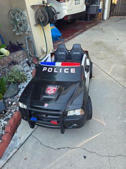 FREE Kid Trax 12-Volt Dodge Charger Pursuit Police Car Ride-On Toy- needs new battery