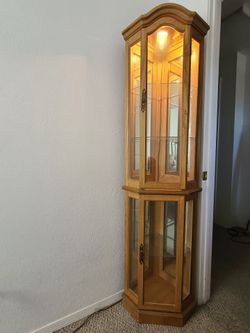 Corner Curio Cabinet with Interior Lighting and Glass Shelves