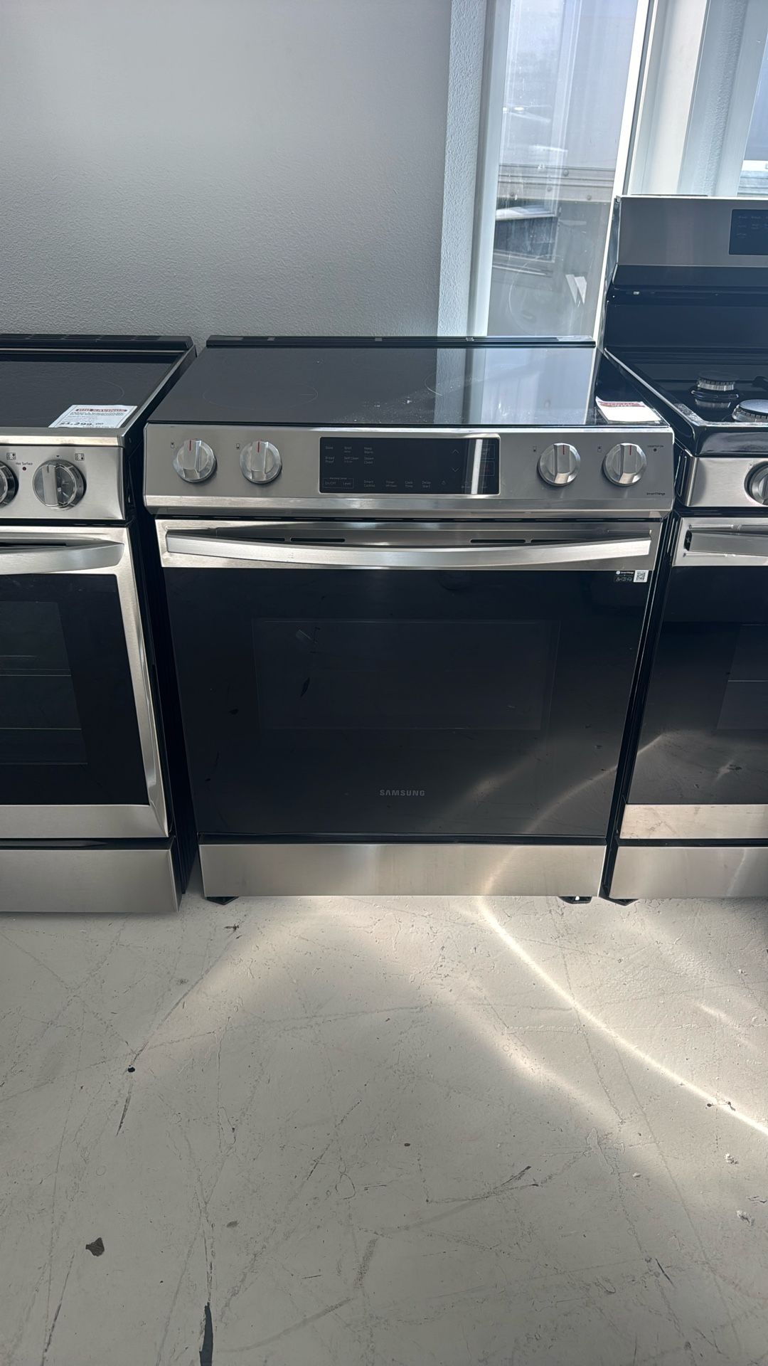 Samsung - 6.3 cu. ft. Front Control Slide-In Electric Convection Range with Air Fry & Wi-Fi, Fingerprint Resistant - Stainless Steel