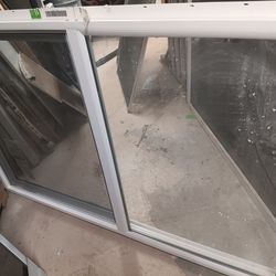 Brand new sliding glass window.  Never installed,  just decided to go with a bigger window.