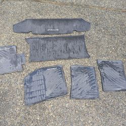 Full set of Toyota Prius rubber mats front, middle and rear.