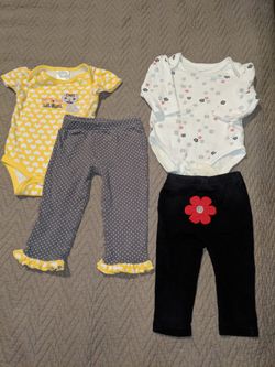 Two outfits 0-3 mo e109 very small stain on inside white