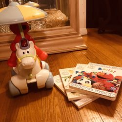 I Couldn’t Find This Elmo Toy Online. It Plays Music And Moves Around, The Umbrella Twirls around As Well (3AAA) batteries Read Description 