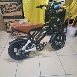 Tamobyke mini 28mph Up to 50 miles range