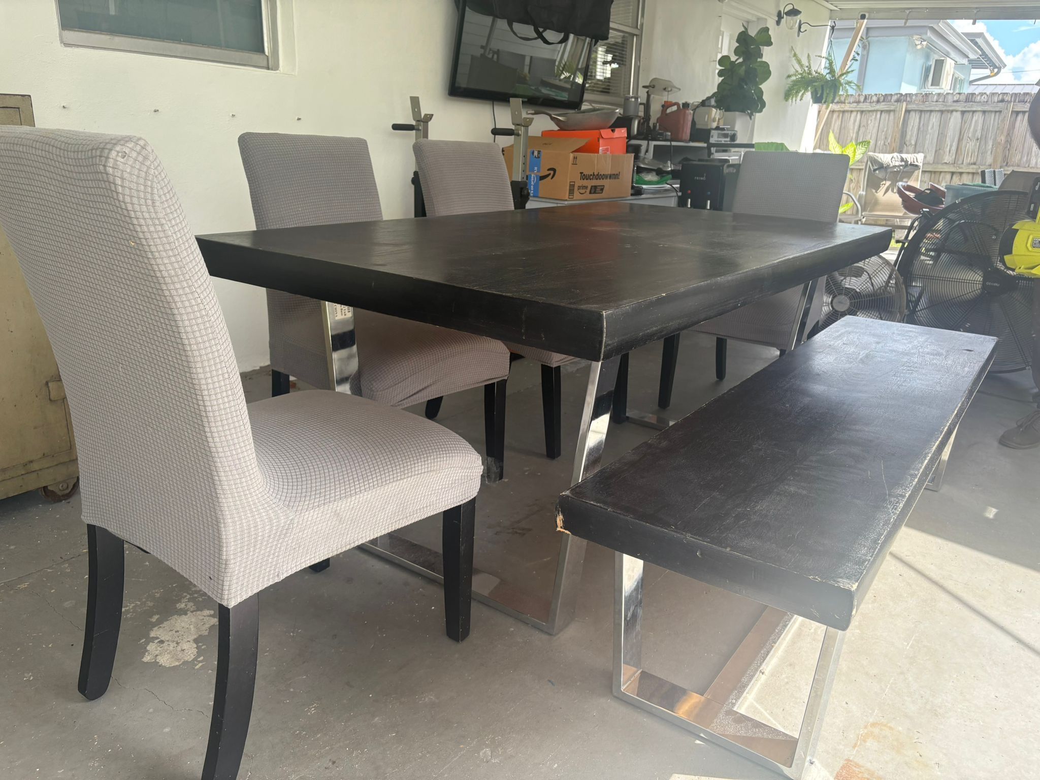 Wooden Table with 4 Chairs and Branch