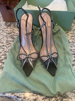 Andrea Wazen kay heels