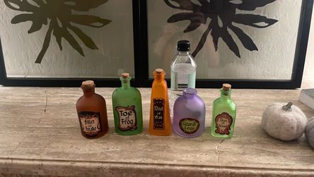 5 bottle decorative Halloween prop labeled