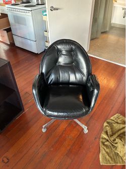 Black leather swivel chair